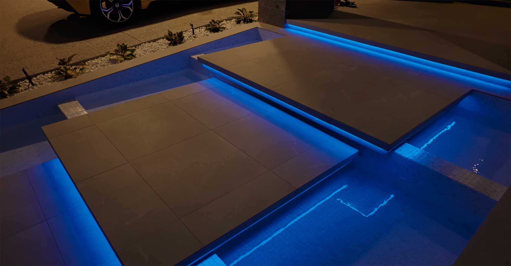 LED pool lighting system casting vibrant colors across water surface
