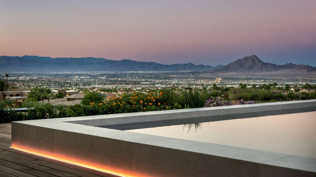 Moonscape landscape lighting creating subtle ambient glow