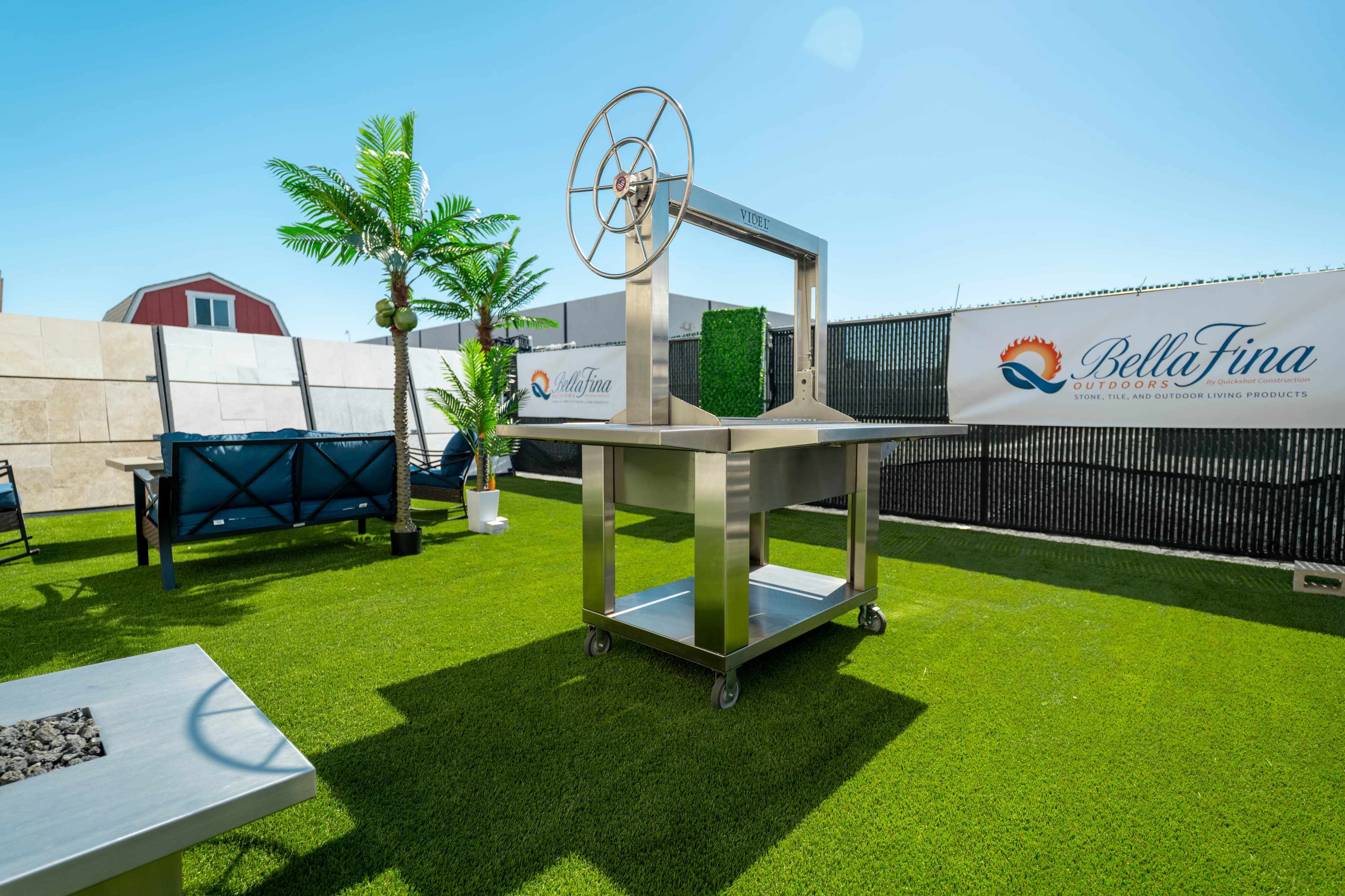 Full outdoor kitchen display with integrated grill and storage